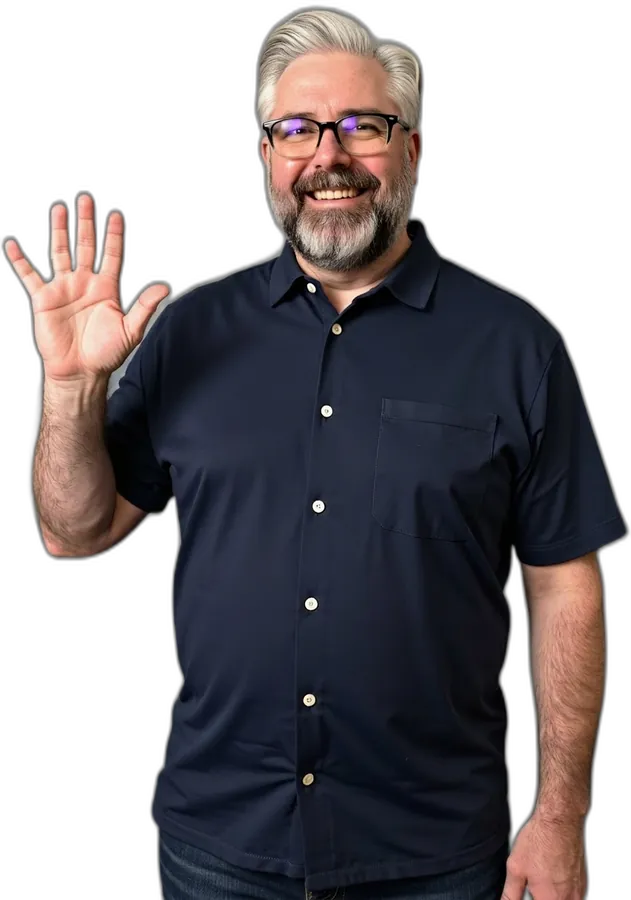 Jeremy Kenerson, Founder and CEO of DeskTeam360, smiling and waving